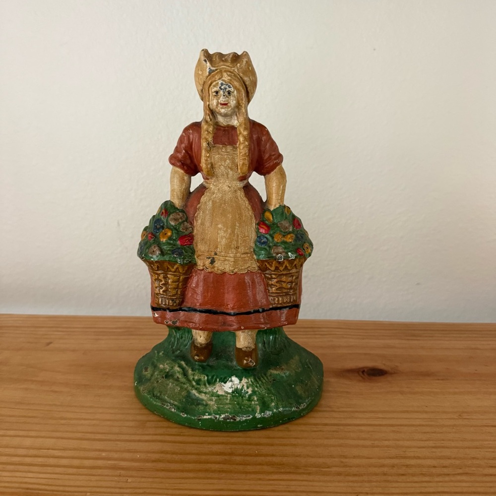 Antique Hubley Cast Iron Dutch Girl with Flowers Door Stop